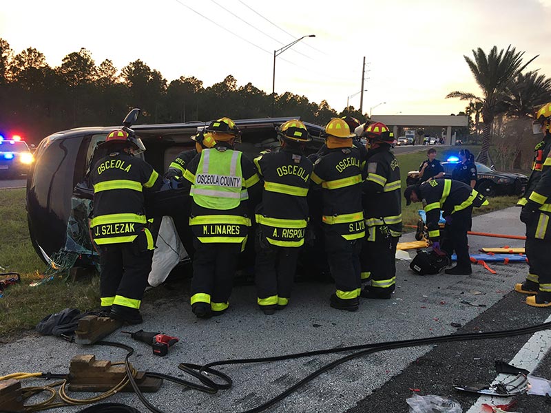 Osceola County fireman rescue person from wrecked car