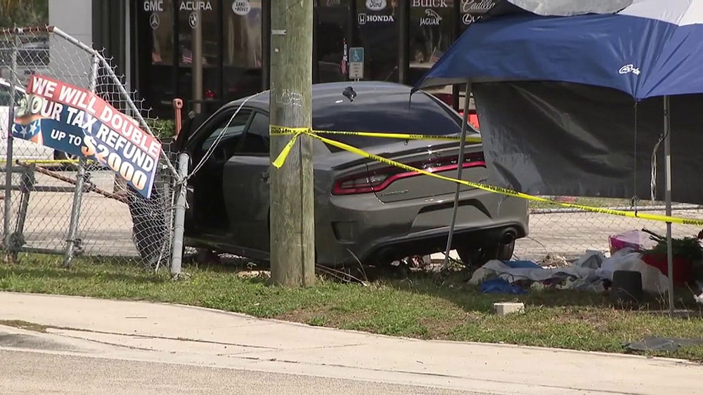 Dodge Challenger wrecked into a tent
