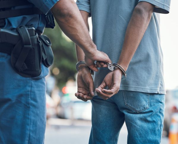 handcuffed criminal, crime in florida